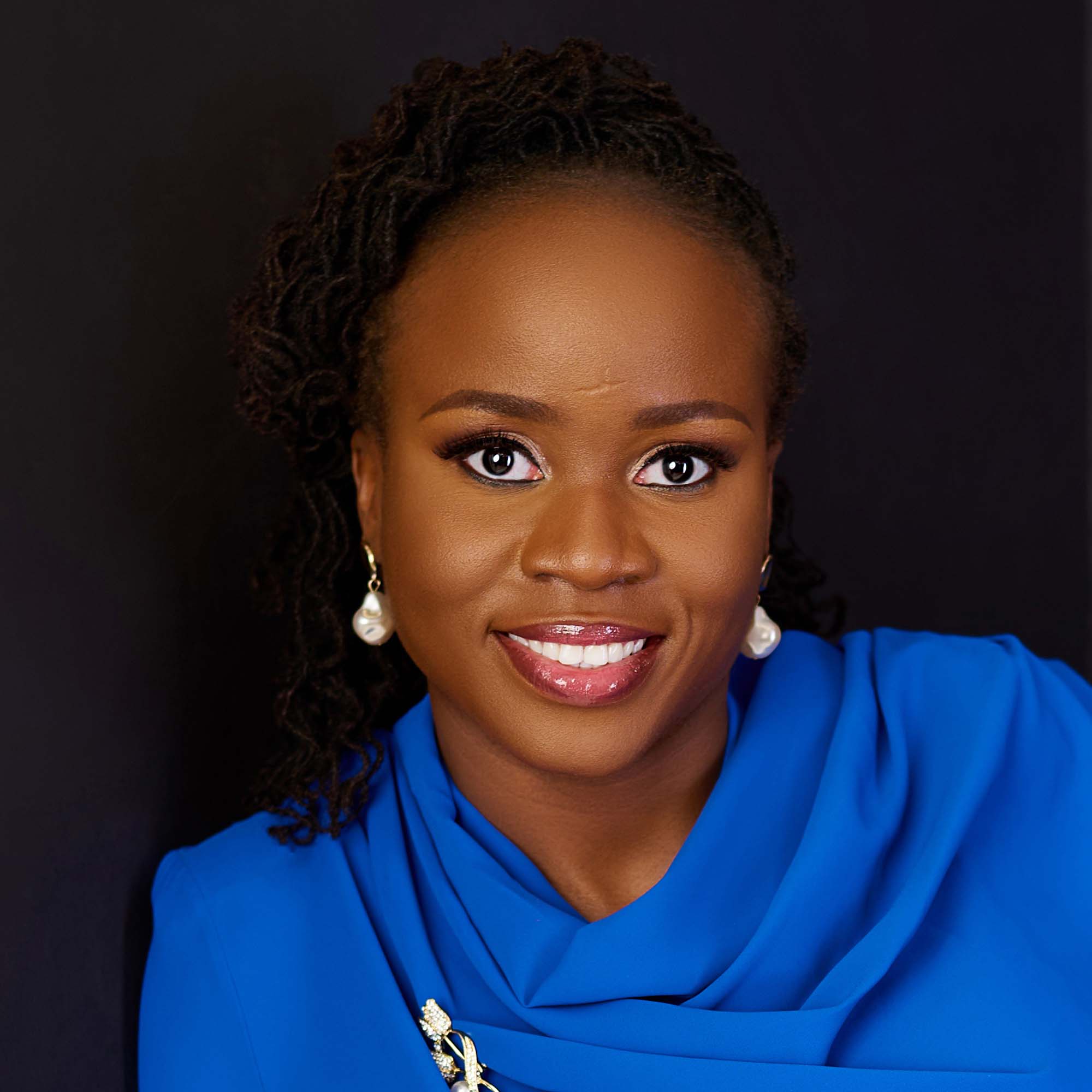 Bimbo Ogunsola, founder of Young and Aligned, leading a clarity session for young adults
